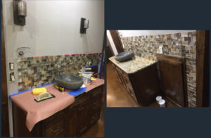 Bathroom renovation with stone countertop and backsplash.